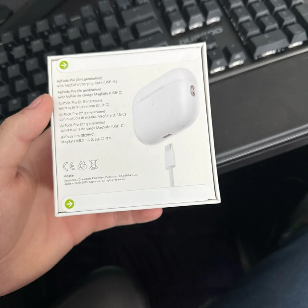 Apple AirPods with White Charging Case - Picture 3 of 4
